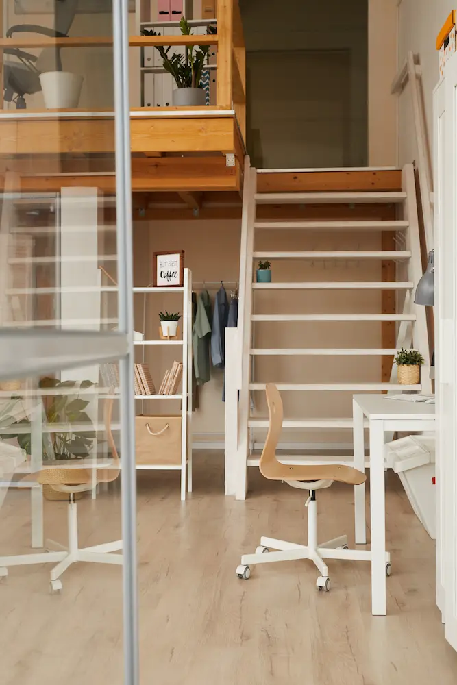 Small Spaces Remodeling - Modern home office with wooden decor and minimalist design